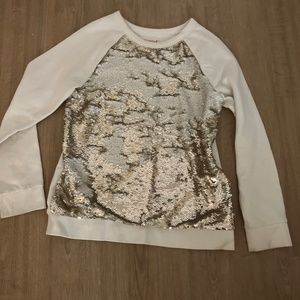Sequence, gold sweater